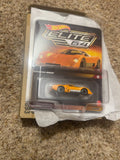 Orange Hot Wheels Elite 64 McLaren M6GT #12 on card