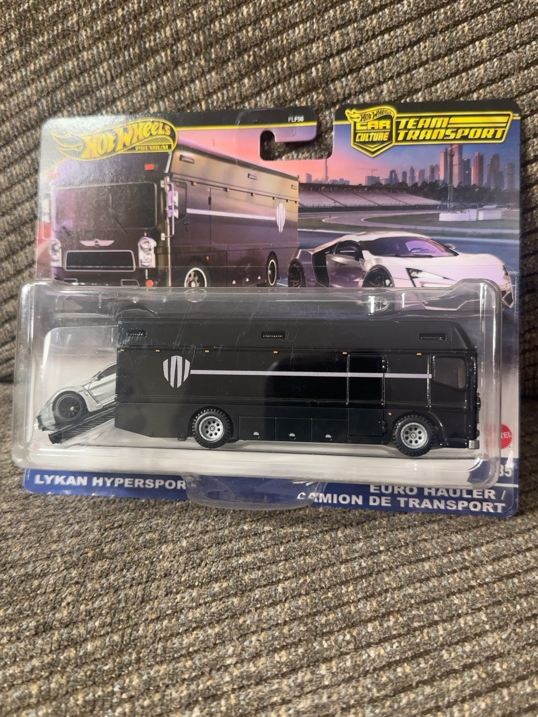 Actual photograph of Lykan Hypersport and black Euro Hauler Hot Wheels Team Transport #85 in package